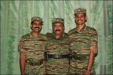 LTTE leader Velupillai Pirapaharan with Tamileelam Air Force (TAF) Black Tiger pilots Col. Rooban and Lt. Col. Siriththiran [Photo: LTTE]