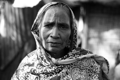 An elderly Rohingya woman living in slum area of Cox's Bazar district, Bangladesh. There are Rohingya dwellers who came to Bangladesh in 1978 when 250,000 Rohingya refugees influxed from Burma due to military operation as well as those who arrived in 2012, when the sectarian violence has turn to be a massacre of Rohingya community. (Photo © Lee Yu Kyung)