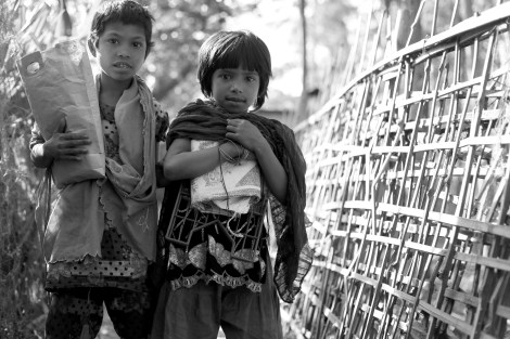 Rohingya children living in slum area in Cox’s Bazar, Bangladesh. Since 1970s hundreds of thousands Rohingya refugees have influxed into neighboring Bangladesh. Most of them have become unregistered refugees who have been living either unregistered camp or slums. (Photo © Lee Yu Kyung)