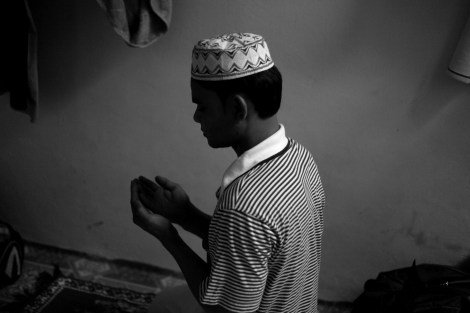 Islam, Rohingya refugee now living Malaysia. He has lost his father during the violence in 2012 and all family members ever since have been living in IDPs camp outskirt of Sittwe. Early in 2014 he has got on the boat in which he has seen some 600 refugees. During the perilous journey, another boat which had embarked together with Islam’s boat was sunken. “460 people on the sunken boat drowned in front of our full eyes” he said. (Photo © Lee Yu Kyung) 