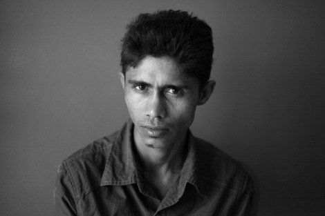 Forkana Mohammad (28) has left Burma right after the first wave of violence which happened in June 2012 and now living in Malaysia since July 2013. In a smugglers’ jungle camp in Southern Thailand, to where most of boat people were brought before being smuggled into Malaysia or trafficked to various locations, he said he’s seen two Rohingyas who were staying for 4 years as semi-slavery as they could not afford payment to smugglers. (Photo © Lee Yu Kyung) 