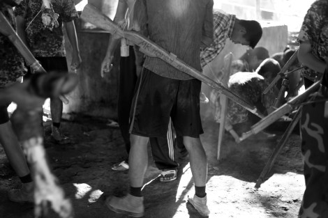 Kachin youths in Educational and Economic Development for Youth (or EEDY) training ground. The Course involves military training with wood gun, Kachin history and English etc. After training, most of them would go back to their normal life different parts of the country. Since the war resumed, Kachin youths from all over the country have tried to reach their home land to take EEDY course. (Photo © Lee Yu Kyung)