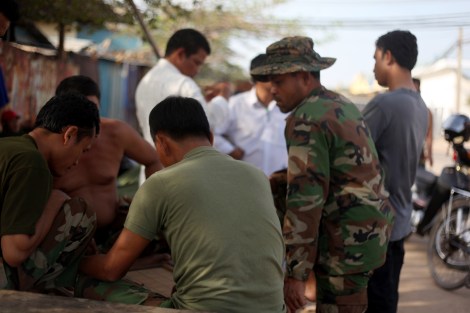After the violent crackdown on striking workers by military police as well as ‘911 special forces’ whose base is stationed next to Yakjin Trading Co., Royal Cambodian Armed Forces (or RCAF) Brigade 70 have been deployed in charge of protecting Canadia Industrial Park in Phnom Penh. Both the elite 911 unit and Brigade 70 forces, being trained for anti-terrorism, are infamous with their human rights violation.
