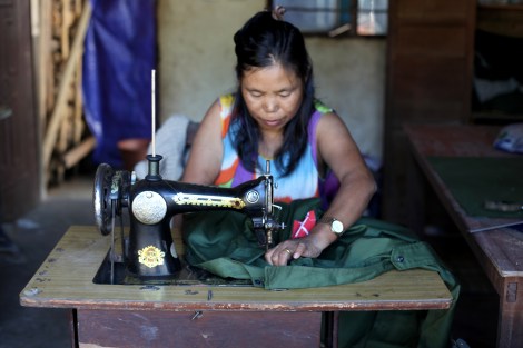 A woman tailor is making Kachin Independence Army or KIA’s uniform in Laiza, the rebel’s capital. KIA is military wing of Kachin Independence Organization (or KIO) which has been fighting for greater autonomy since 1961. (Photo © Lee Yu Kyung)