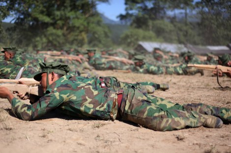 Kachin youths in Education and Economy of Development for Youth (or EEDY) training session. The Course involves military training with gun made of wood Kachin history and English etc. After training everyone goes back to ordinary life. However, Kahin youths all over the country have tried to reach their home land to take EEDY course. (Photo © Lee Yu Kyung)