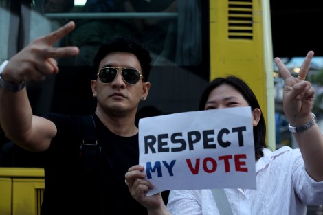 Ake Ottagon (34) at ‘Respect My Vote’ campaign early this year. He was shouting “Respect My Vote!” at a press conference by Democrats - the party associated with conservatives and has a history of  boycotting election. Since his slogan has become campaign for democracy. (© Lee Yu Kyung 2014)